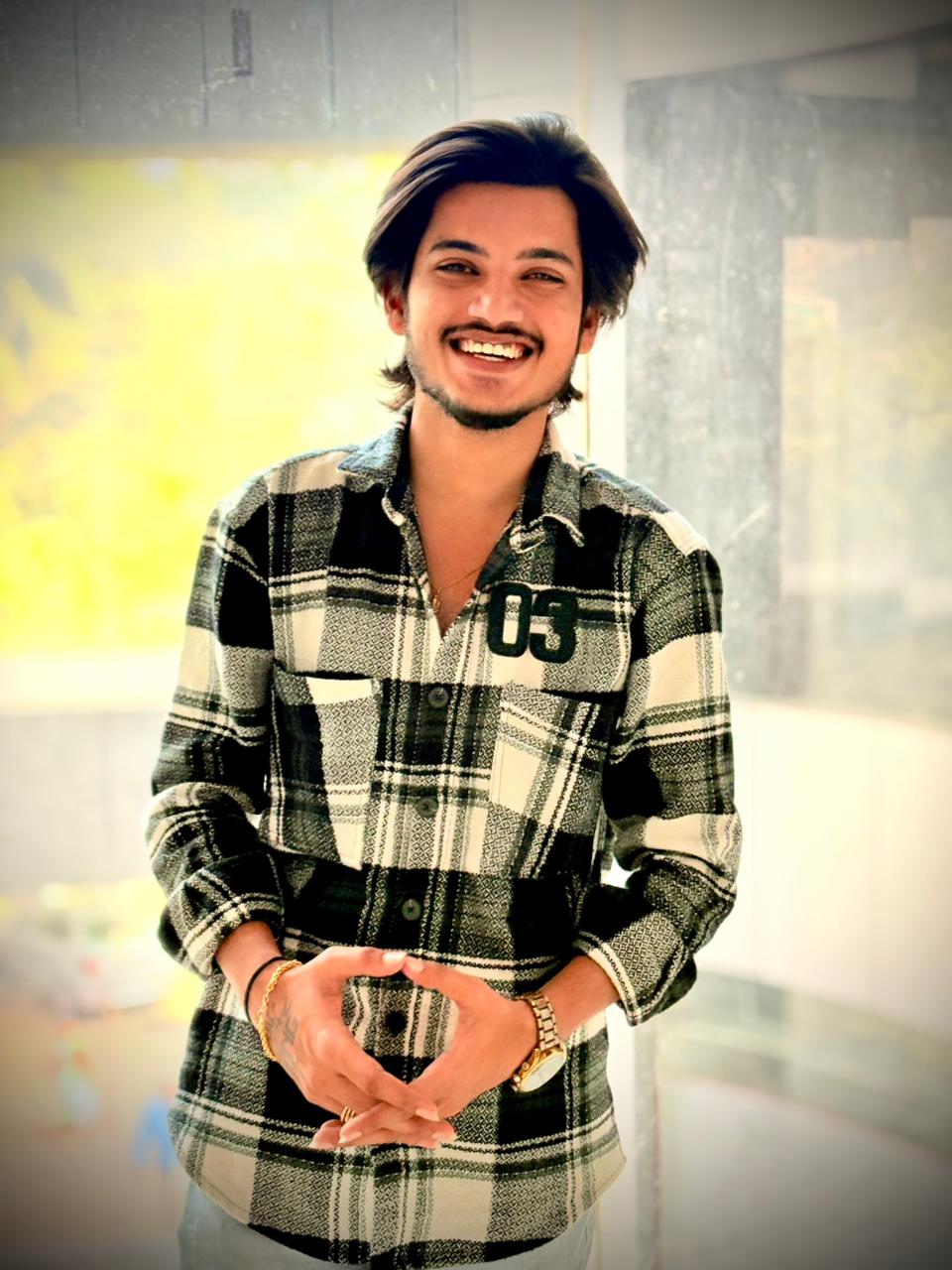 Influencer sitting outdoors